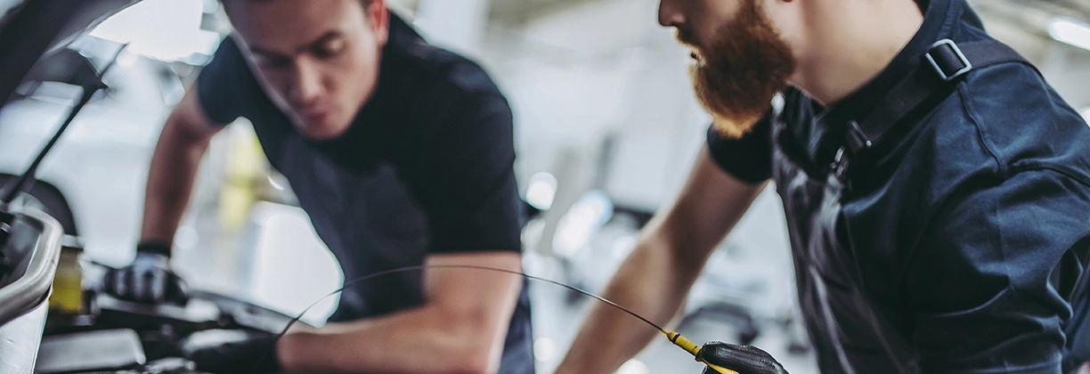 two mechanics working